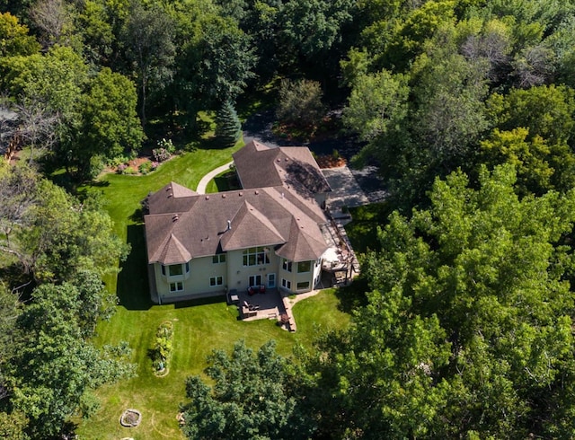 drone / aerial view with a view of trees