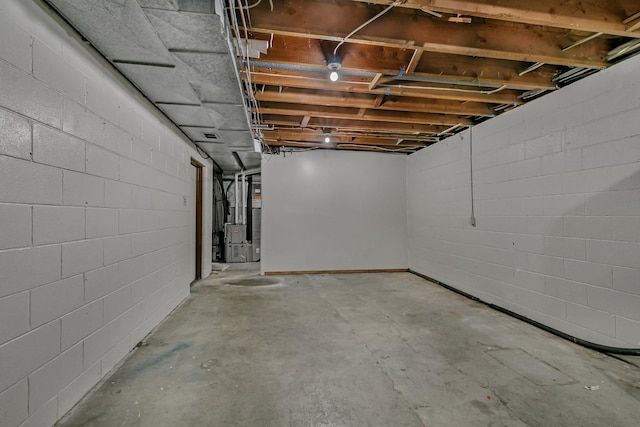 unfinished basement with heating unit