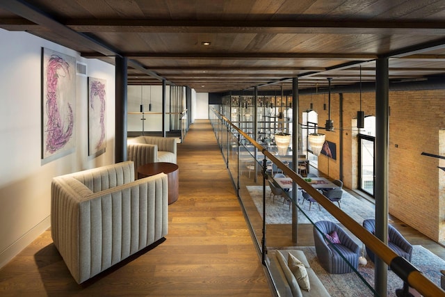 interior space featuring wood finished floors and wooden ceiling