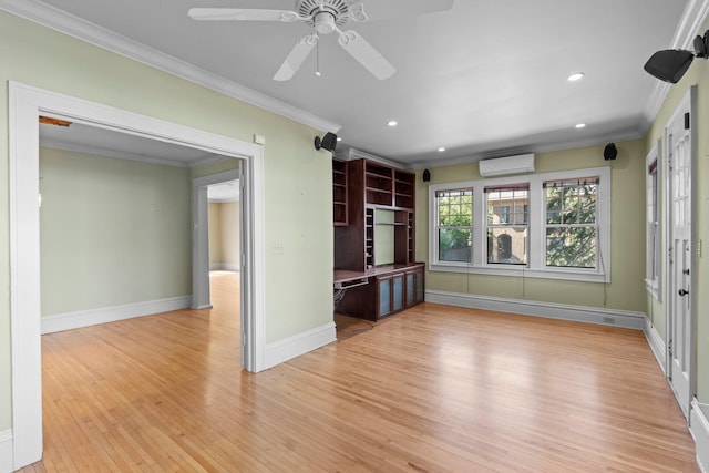 unfurnished living room featuring a wall mounted AC, light wood-type flooring, recessed lighting, baseboards, and ornamental molding