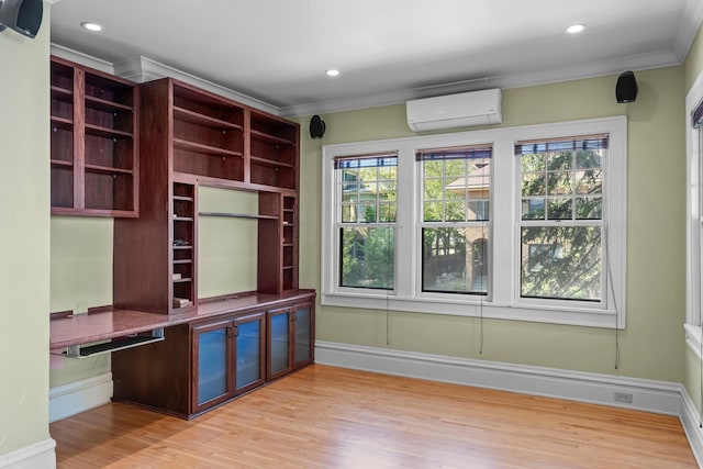 mudroom with an AC wall unit, ornamental molding, light wood finished floors, baseboards, and recessed lighting