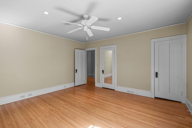 unfurnished bedroom with light wood-style flooring, baseboards, recessed lighting, crown molding, and a ceiling fan