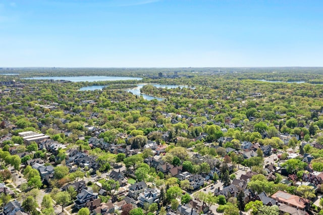 aerial perspective of suburban area featuring a large body of water