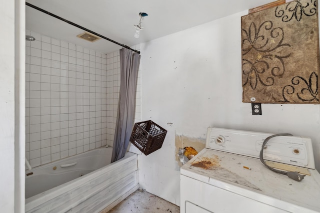 full bathroom featuring washer / clothes dryer, shower / bath combo, and visible vents