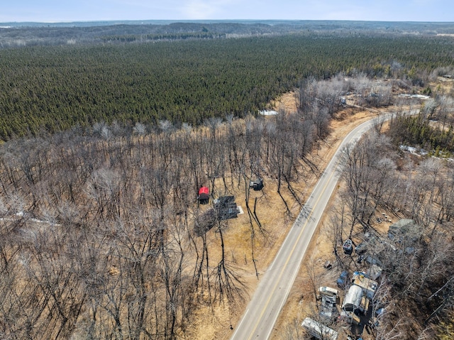 aerial view with a wooded view