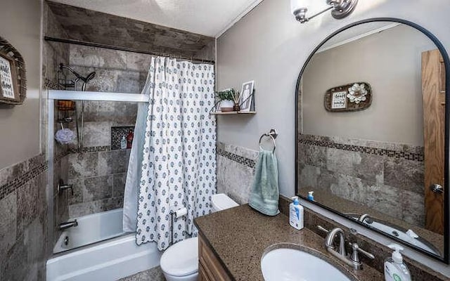 bathroom featuring toilet, vanity, and shower / bath combination with curtain