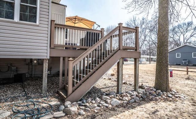 exterior space featuring stairway and a deck