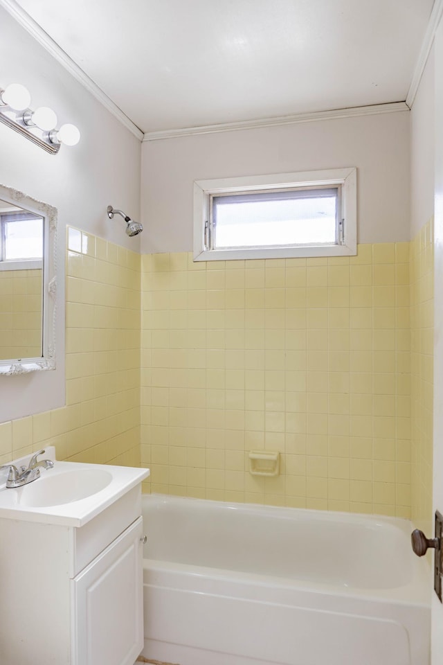 full bathroom with bathtub / shower combination, crown molding, and vanity