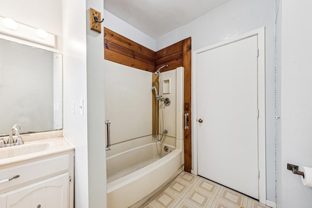 full bathroom featuring tile patterned floors, vanity, and  shower combination