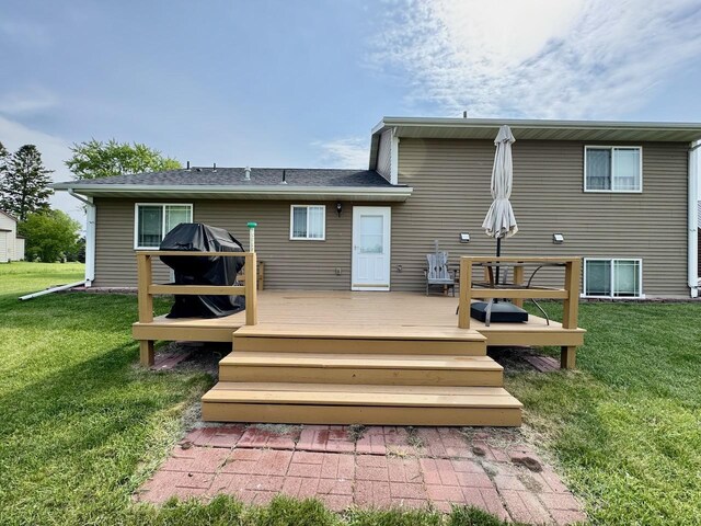 32406 Starland Shore Dr, Dent, MN 56528 - back of property with a yard and a deck