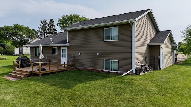 32406 Starland Shore Dr, Dent, MN 56528 - rear view of house with a yard, a deck, and a shingled roof