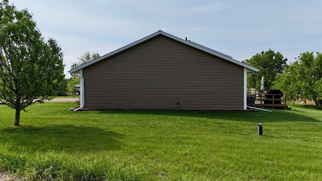 32406 Starland Shore Dr, Dent, MN 56528 - view of side of property with a lawn