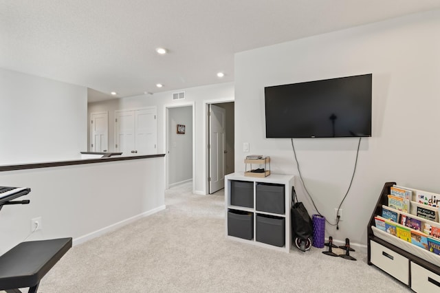 playroom with carpet flooring, recessed lighting, visible vents, and baseboards