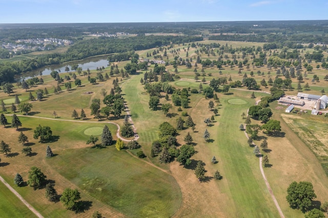 birds eye view of property featuring a water view and golf course view