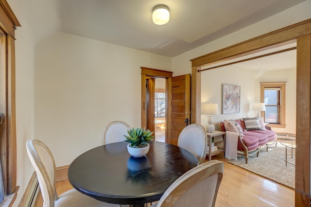 2538 Jefferson St NE, Minneapolis, MN 55418 - dining area featuring light wood-style flooring and lofted ceiling