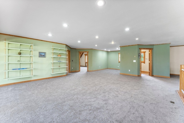 interior space featuring recessed lighting, baseboards, and ornamental molding