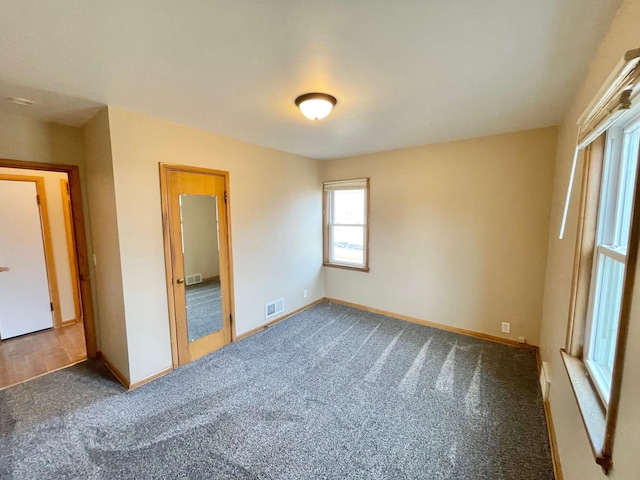 421 Van Dusen St, Springfield, MN 56087 - unfurnished bedroom featuring carpet and baseboards