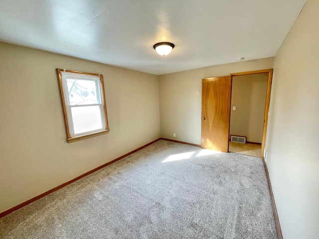 421 Van Dusen St, Springfield, MN 56087 - unfurnished room with carpet floors and baseboards