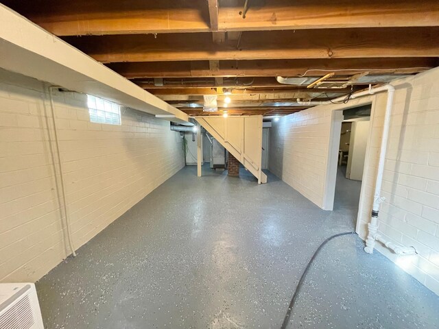 421 Van Dusen St, Springfield, MN 56087 - below grade area featuring stairway and concrete block wall