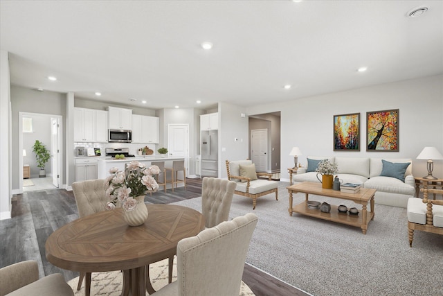 dining space featuring recessed lighting, baseboards, and dark wood-style flooring