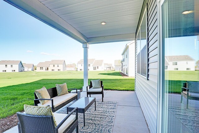 view of patio with a residential view and an outdoor living space