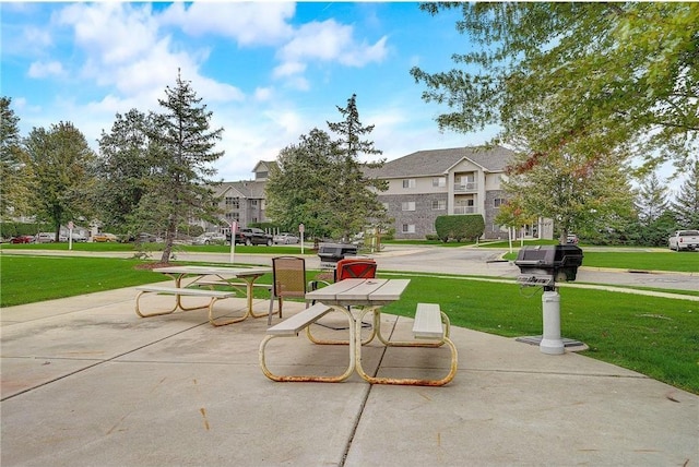 view of community with a residential view and a lawn