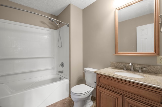 full bathroom with vanity, a textured ceiling, shower / washtub combination, tile patterned floors, and toilet