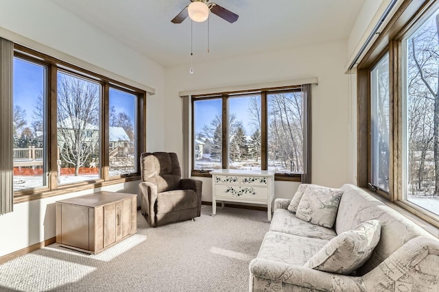 sunroom / solarium with ceiling fan