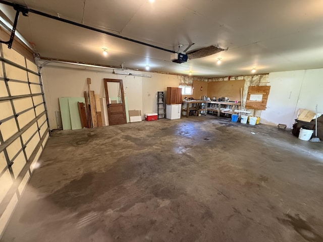 902 Pacific Ave, Kerkhoven, MN 56252 - garage featuring a garage door opener