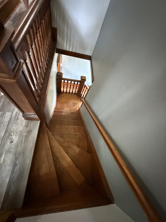 902 Pacific Ave, Kerkhoven, MN 56252 - staircase featuring wood finished floors
