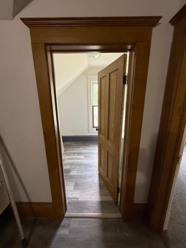 902 Pacific Ave, Kerkhoven, MN 56252 - hallway featuring lofted ceiling and wood finished floors
