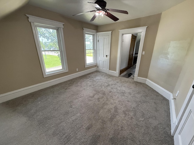 902 Pacific Ave, Kerkhoven, MN 56252 - unfurnished bedroom featuring carpet flooring and ceiling fan
