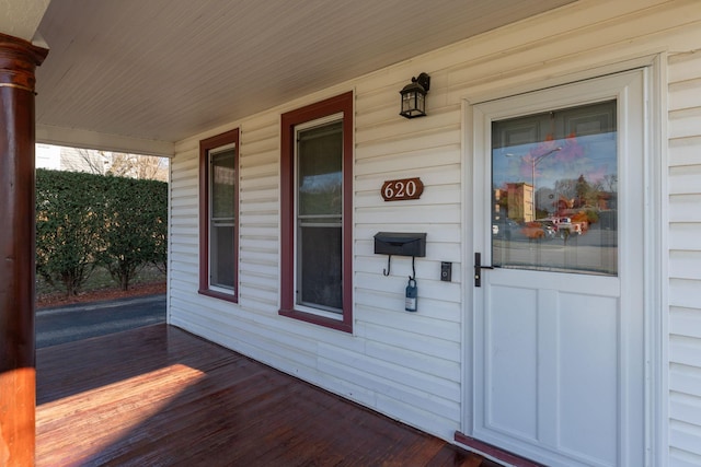 entrance to property with covered porch