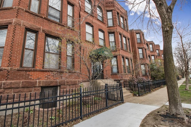 view of property with a fenced front yard