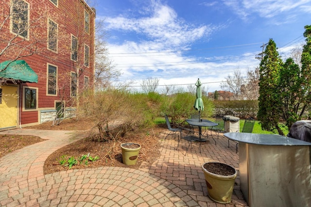 view of patio with outdoor dining area