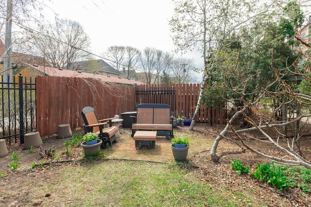 view of yard featuring a fenced backyard