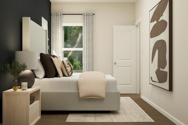 bedroom featuring carpet and baseboards