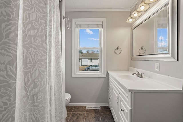 full bath with vanity, baseboards, visible vents, ornamental molding, and toilet