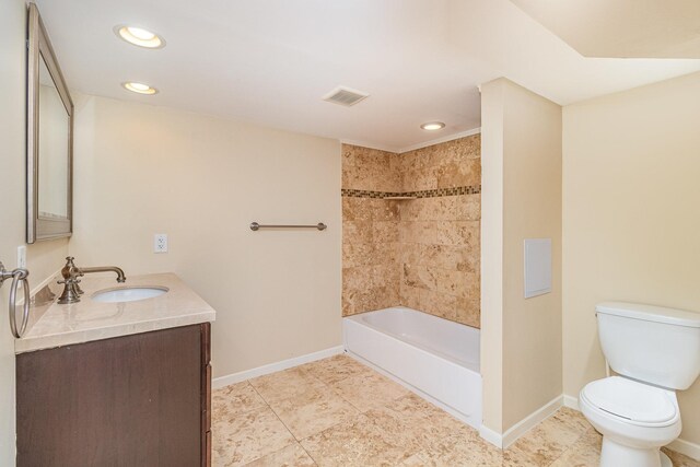 full bath with vanity, toilet, baseboards, and visible vents