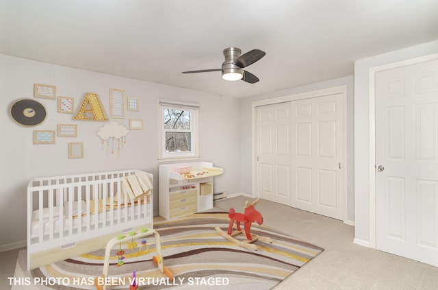 5544 Spruce Rd, Mound, MN 55364 - bedroom with carpet, a closet, a nursery area, and a ceiling fan