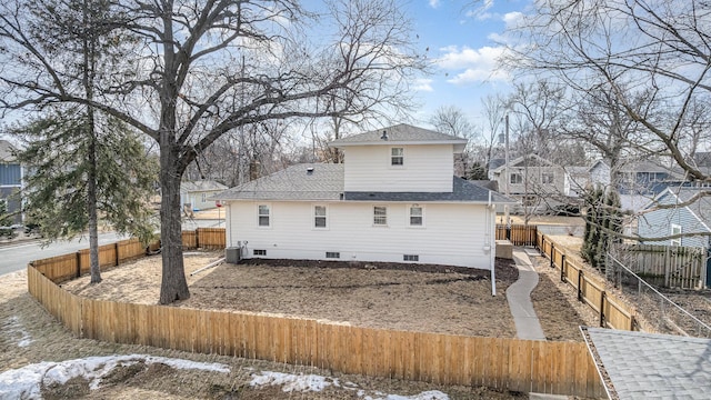 5544 Spruce Rd, Mound, MN 55364 - back of house featuring crawl space, roof with shingles, and a fenced backyard