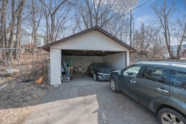 garage featuring fence