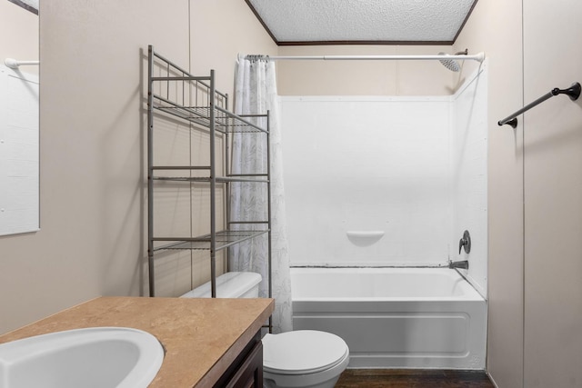 full bath with shower / tub combo with curtain, toilet, ornamental molding, a textured ceiling, and vanity