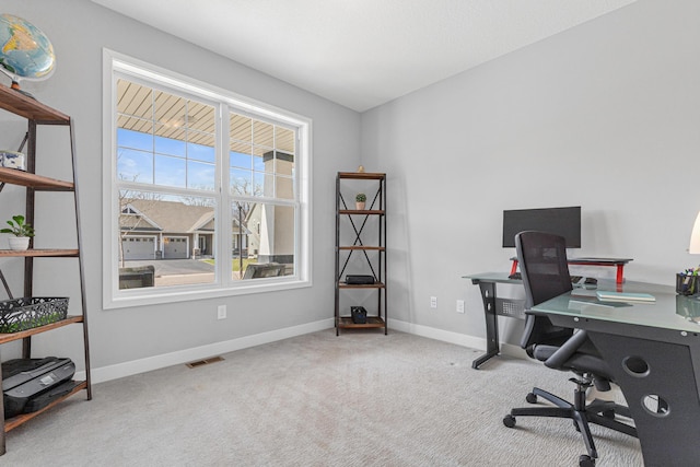 home office featuring visible vents, baseboards, and carpet floors