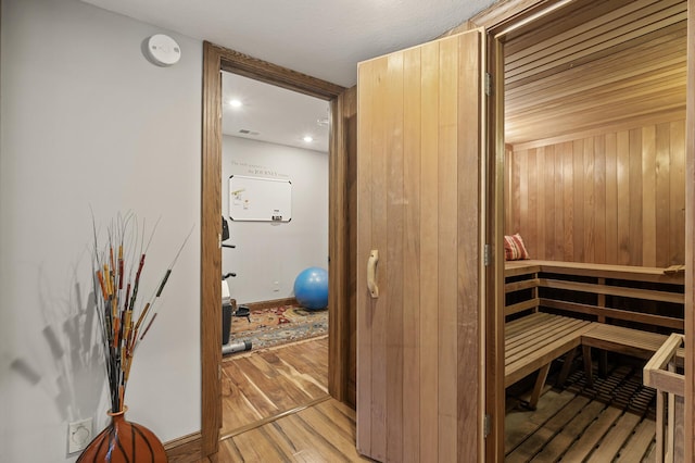 view of sauna featuring wood finished floors