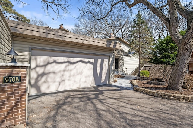 garage with driveway