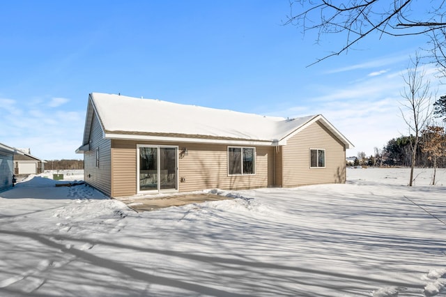 view of snow covered house