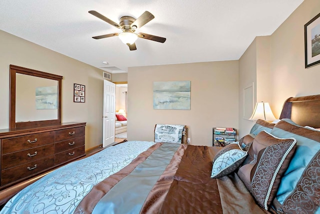 bedroom featuring visible vents and ceiling fan