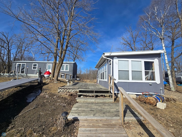 exterior space featuring a wooden deck