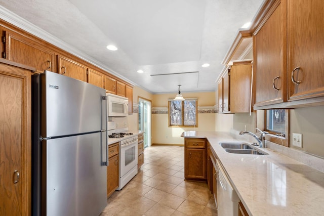 kitchen with a sink, white appliances, light tile patterned flooring, brown cabinetry, and light stone countertops